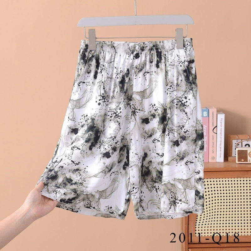 Pantalones cortos holgados de algodón y seda con estampado floral para mujer