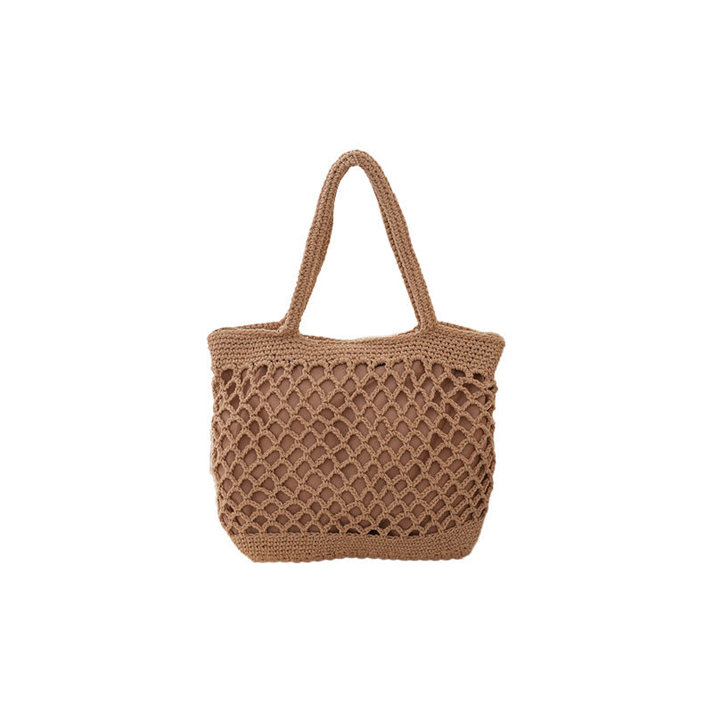 Bolso de mano informal de paja tejido a mano