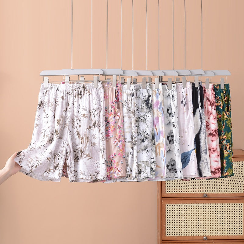 Pantalones cortos holgados de algodón y seda con estampado floral para mujer