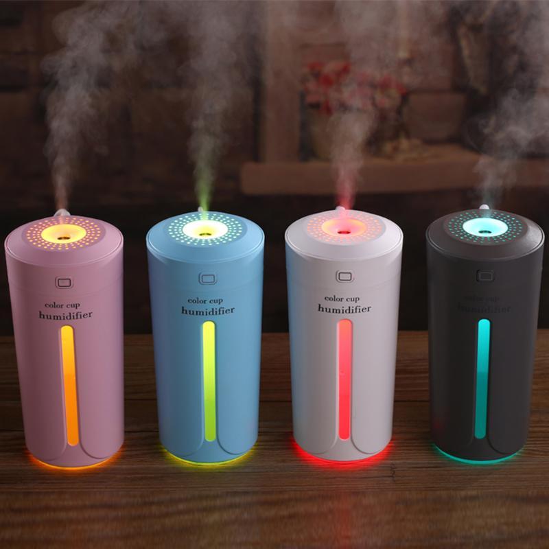 Mini humidificador de aire USB ultrasónico para coche, difusor de aroma eléctrico de aceites esenciales, taza con luces LED de 7 colores.