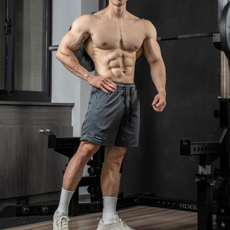 Pantalones cortos transpirables y holgados para hombre, estilo retro, para fitness, deportes y ocio.