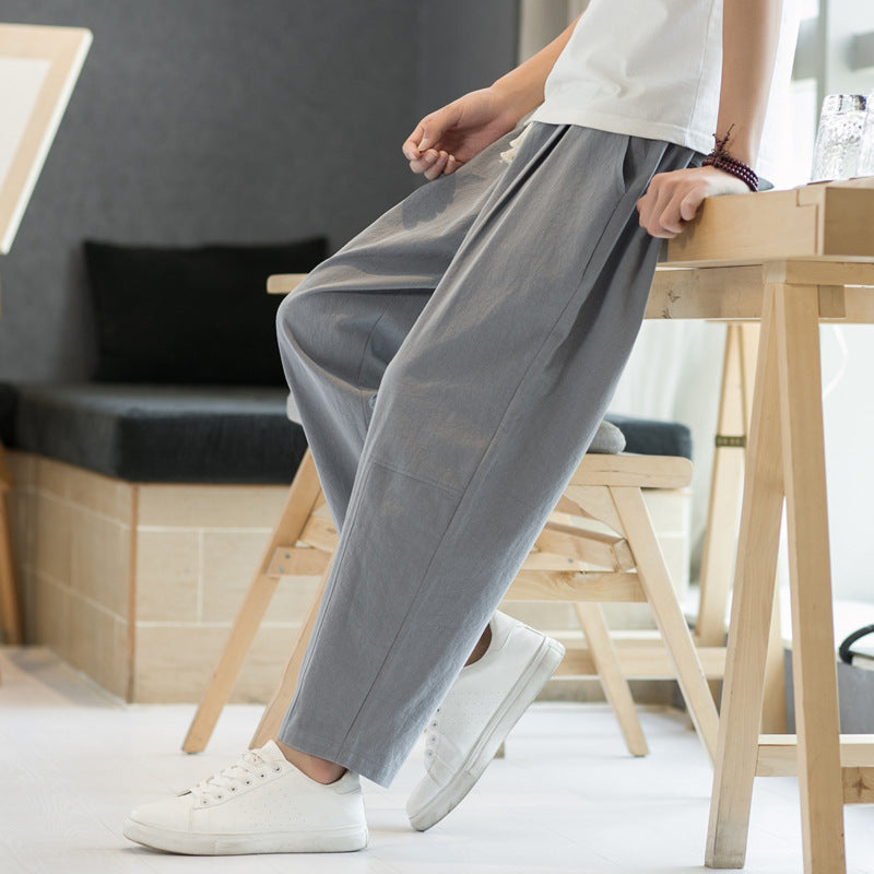 Pantalones casuales de corte recto y holgados de algodón y lino para hombre