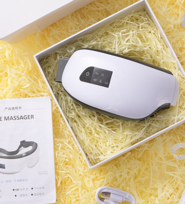 Masajeador de ojos con música Bluetooth, compresa caliente a presión de aire, ojeras, cuidado de los ojos
