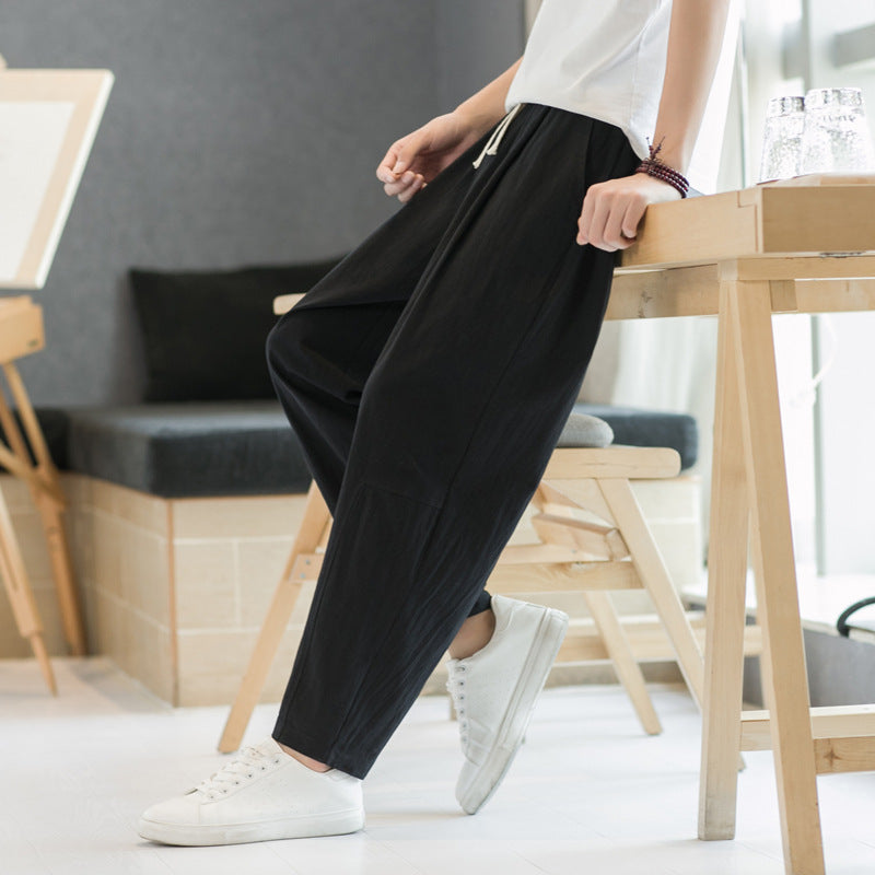 Pantalones casuales de corte recto y holgados de algodón y lino para hombre