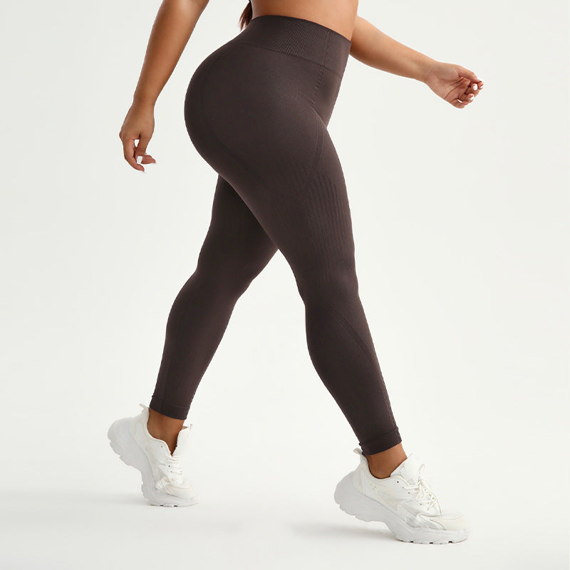 Pantalones de yoga de cintura alta que realzan los glúteos, con absorción de humedad y alta elasticidad.