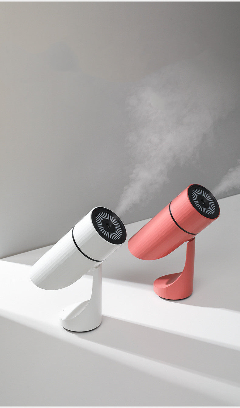 Humidificador de escritorio para coche pequeño con carga USB y ángulo ajustable.