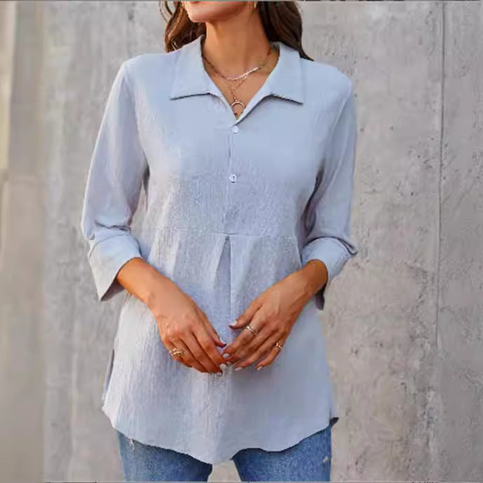 Camisa de mujer de color liso con cuello de solapa, abertura y peplum, manga tres cuartos