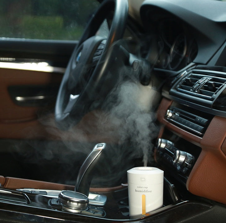 Mini humidificador de aire USB ultrasónico para coche, difusor de aroma eléctrico de aceites esenciales, taza con luces LED de 7 colores.