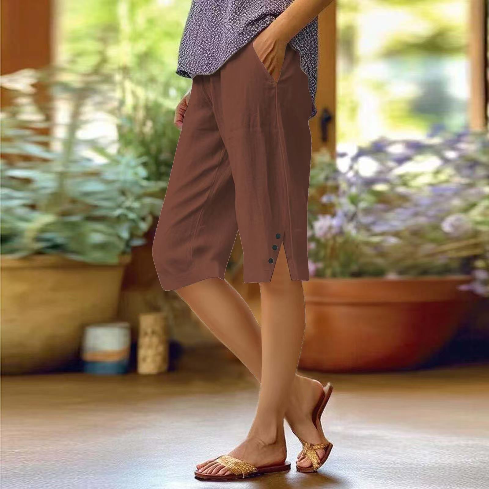 Pantalones casuales holgados de algodón y lino con cintura elástica y bolsillos para mujer.