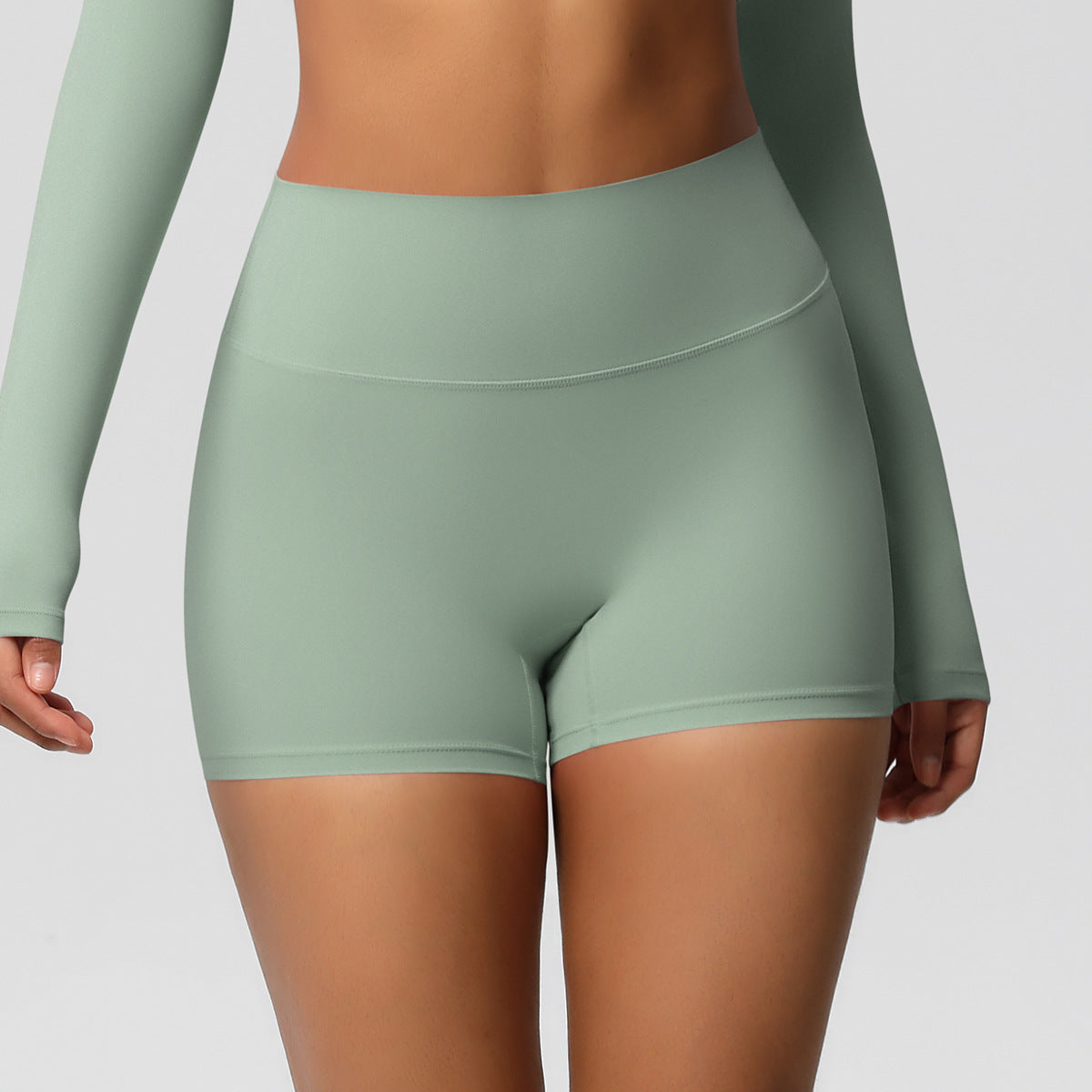 Pantalones cortos deportivos de color liso para mujer, estilo europeo y americano, para yoga.