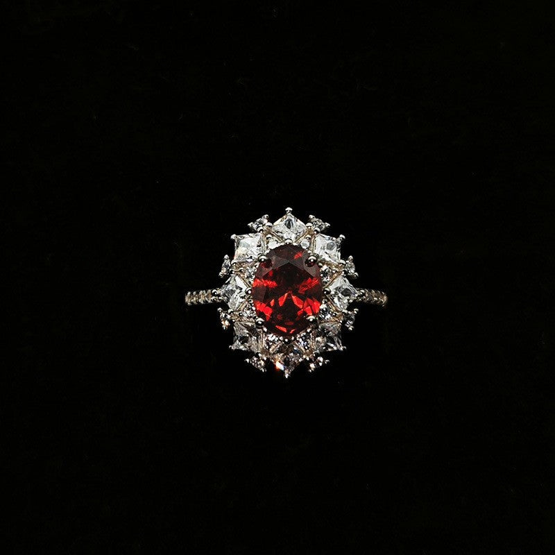 Silver Ring With An Adjustable Opening Featuring A Pigeons Blood Red High carat Zircon