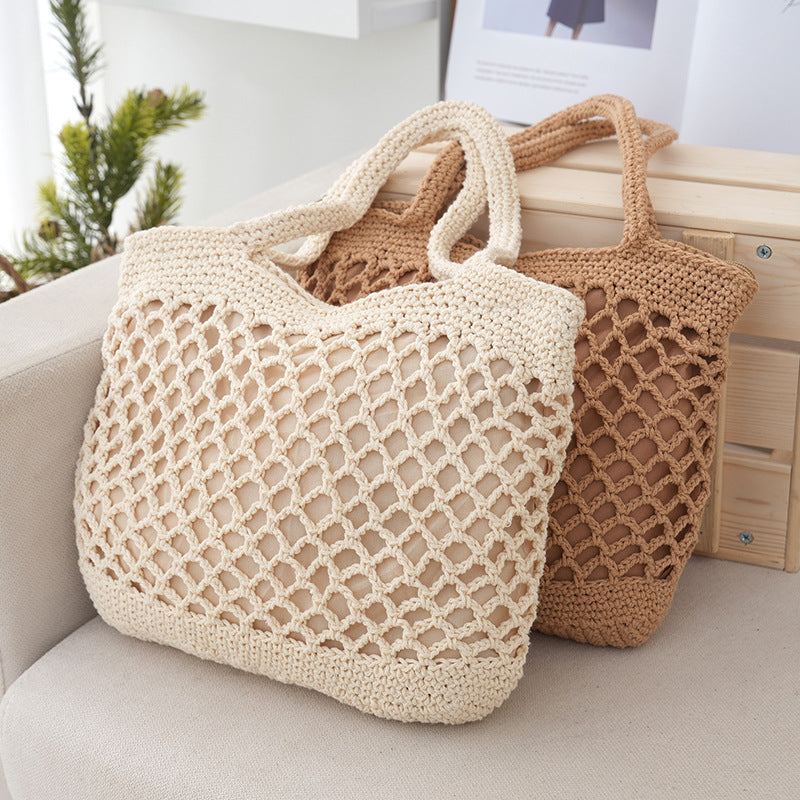Bolso de mano informal de paja tejido a mano
