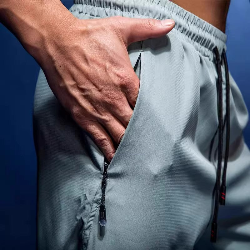 Pantalones cortos deportivos y de fitness informales, holgados, de secado rápido y transpirables para hombre