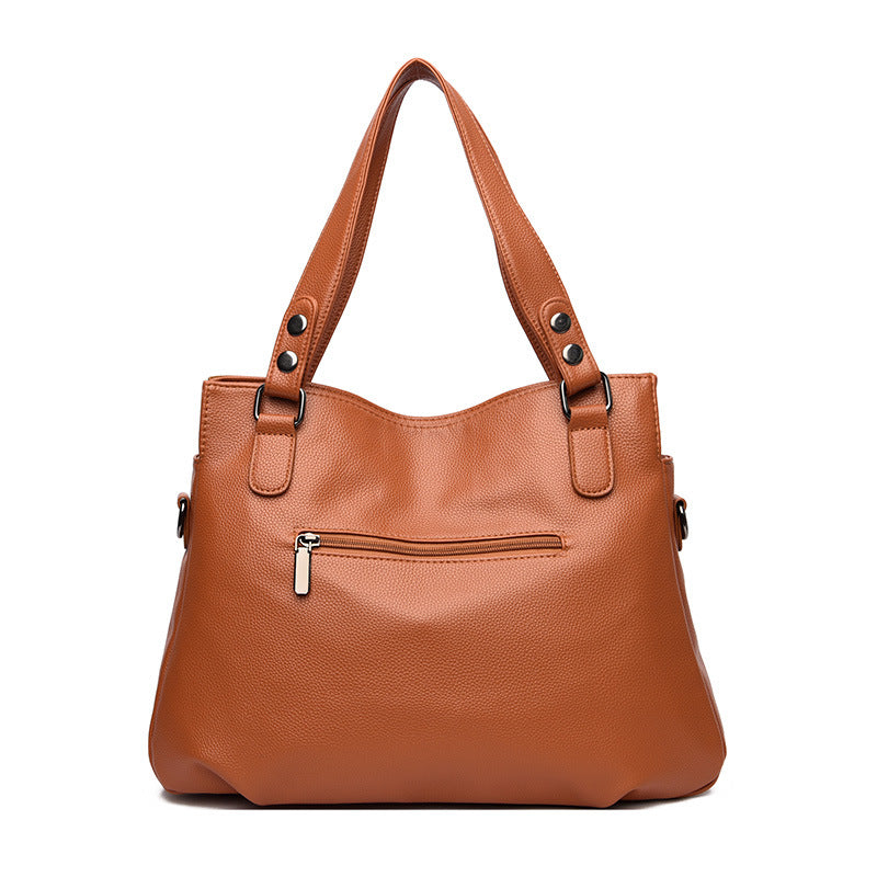 Bolso bandolera de ante con cremallera y borlas retro para mujer