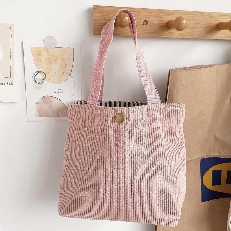 Bolso de lona minimalista de hilo grueso con estampados a doble cara. Un bolso de lona versátil y de gran capacidad para mujer.