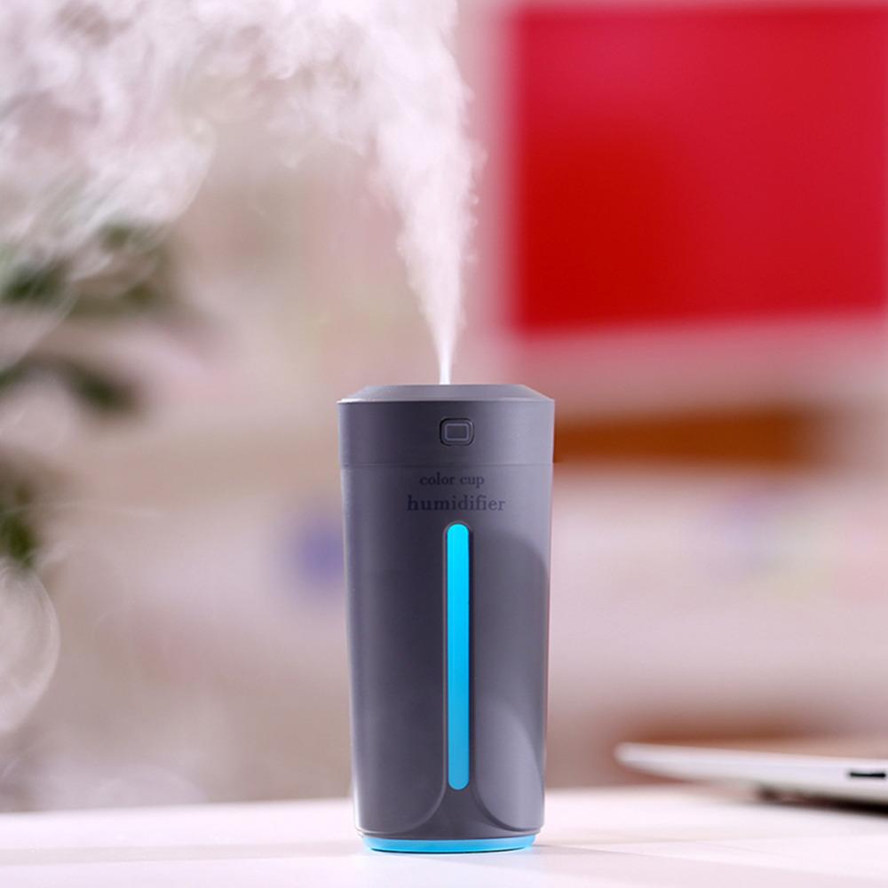 Mini humidificador de aire USB ultrasónico para coche, difusor de aroma eléctrico de aceites esenciales, taza con luces LED de 7 colores.