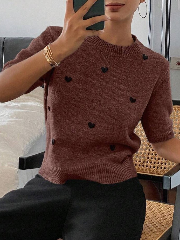 Suéter de punto jacquard con cuello redondo y corazón para mujer