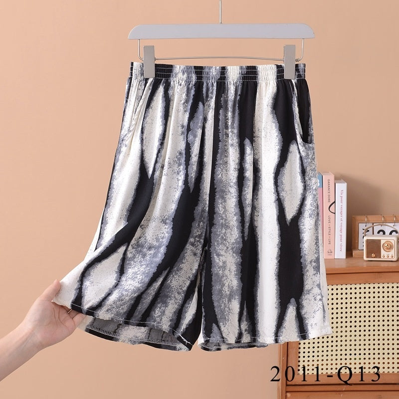 Pantalones cortos holgados de algodón y seda con estampado floral para mujer