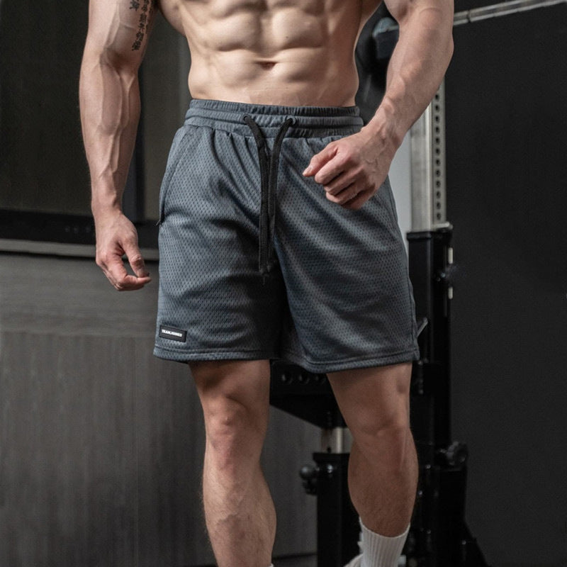 Pantalones cortos transpirables y holgados para hombre, estilo retro, para fitness, deportes y ocio.