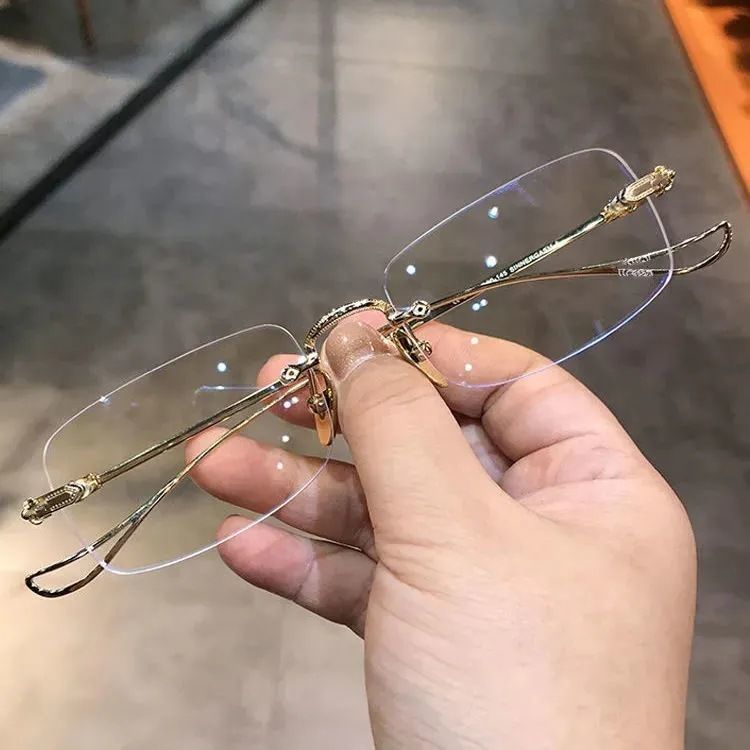 Montura de gafas para miopía vintage, moderna, ultraligera y sin montura, con cambio de color, para hombre.