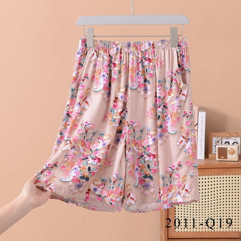 Pantalones cortos holgados de algodón y seda con estampado floral para mujer