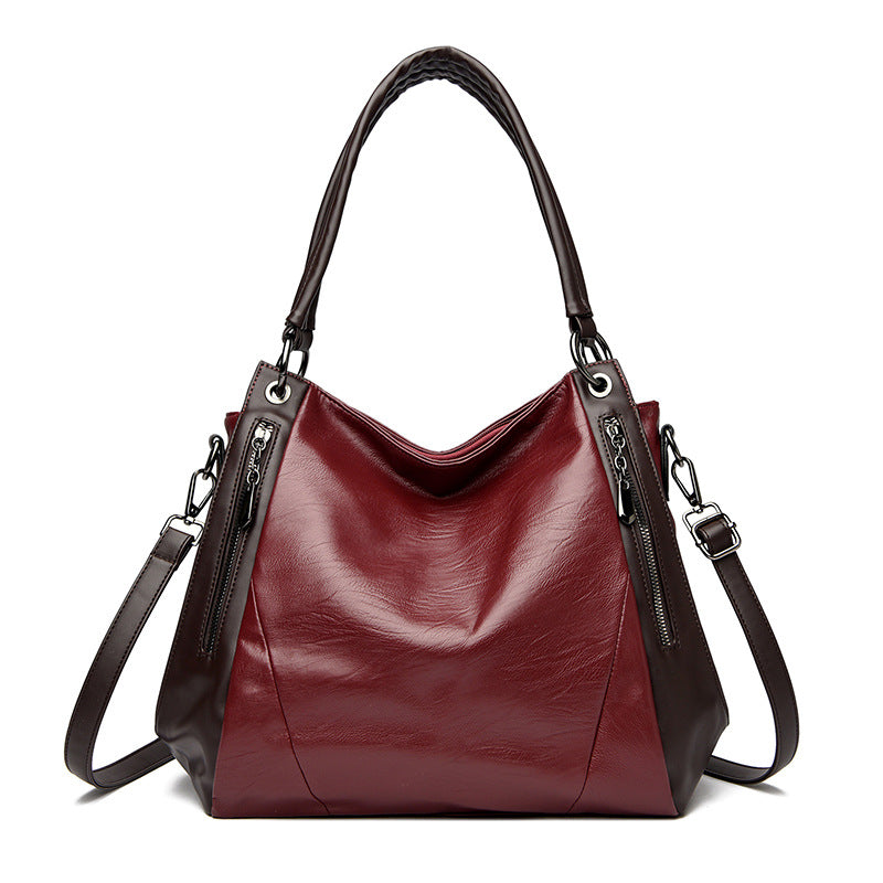 Un bolso tote de cuero suave, sencillo y versátil