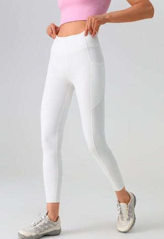 Leggings deportivos elásticos de malla con bolsillos laterales