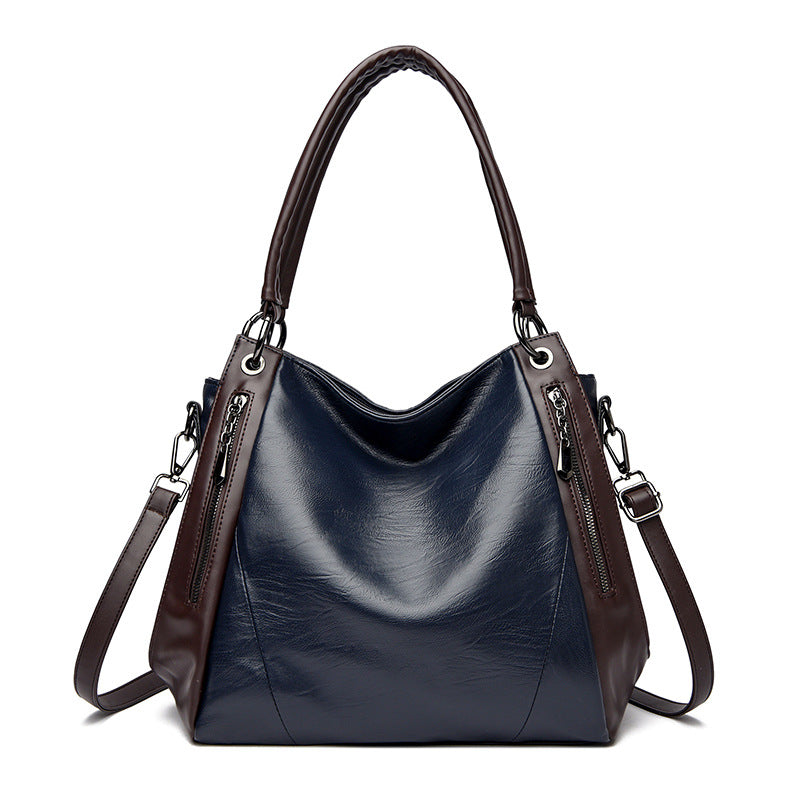 Un bolso tote de cuero suave, sencillo y versátil