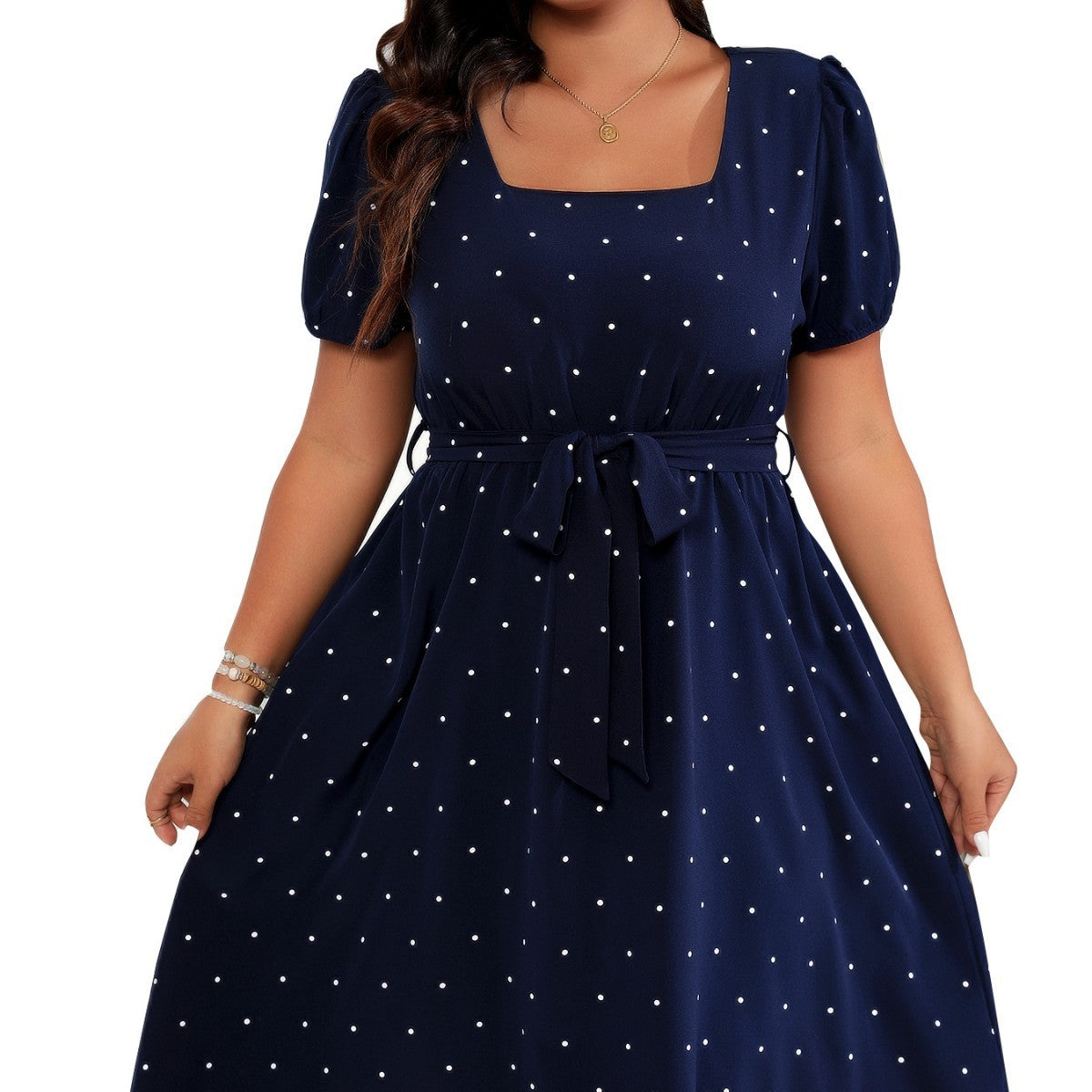 Elegante vestido retro de lunares con cintura ceñida para mujer