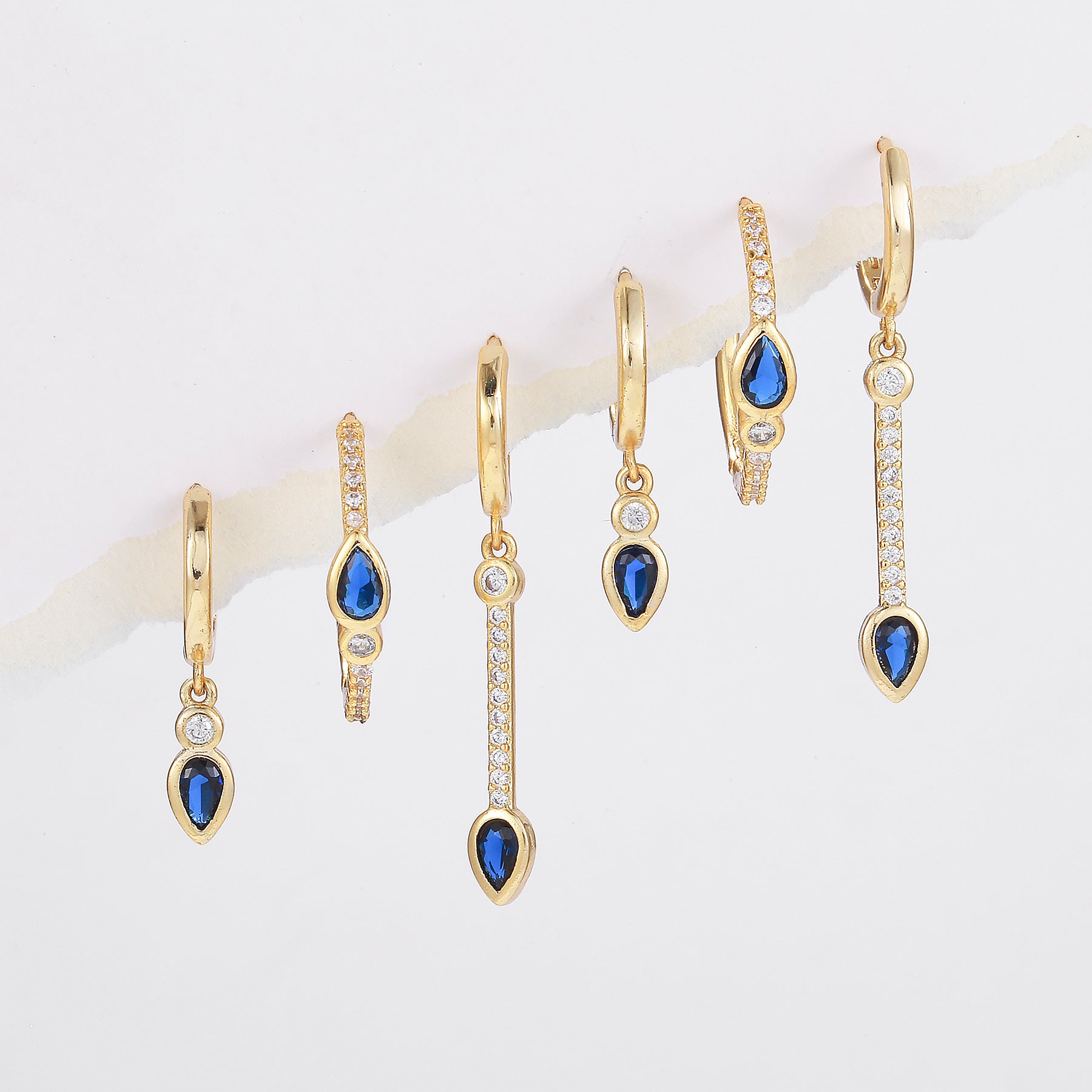 Stylish Blue Zircon Heart-shaped Earrings Exude A Touch Of Understated Luxury
