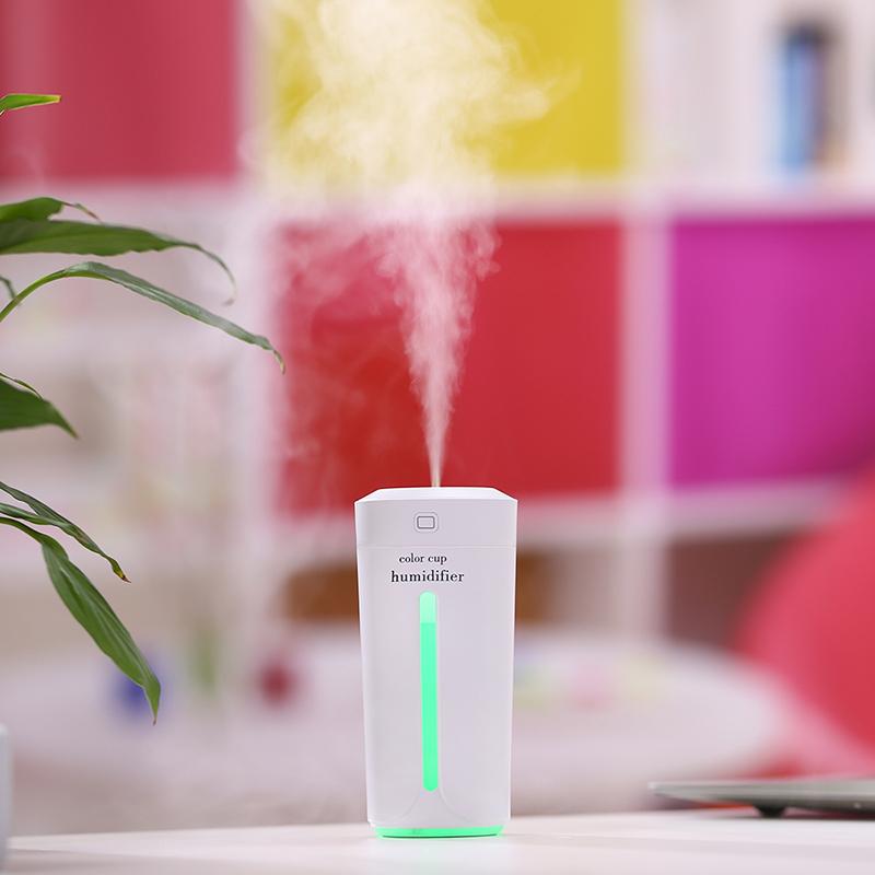 Mini humidificador de aire USB ultrasónico para coche, difusor de aroma eléctrico de aceites esenciales, taza con luces LED de 7 colores.