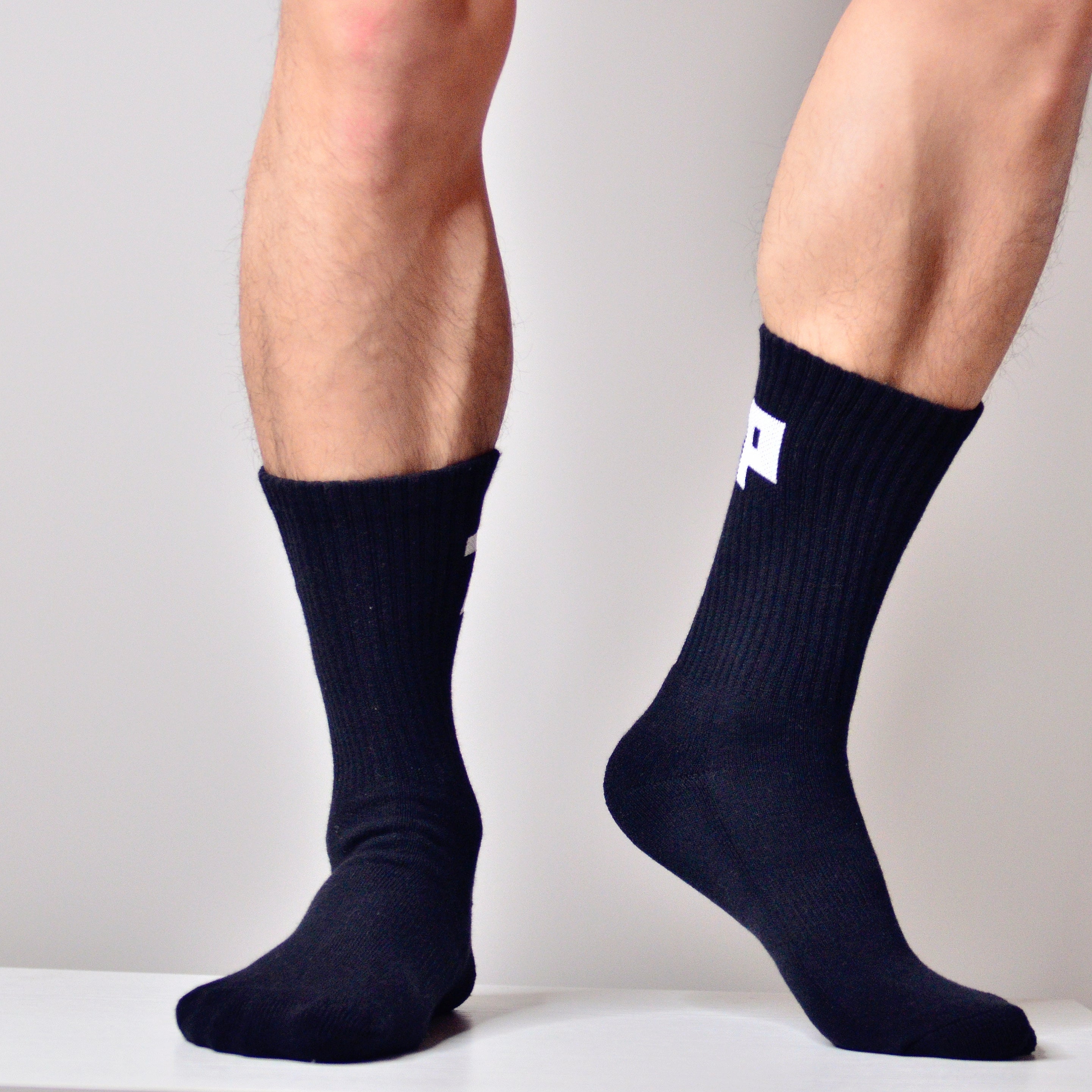 Calcetines deportivos y de fitness con caña alta y suela de rizo