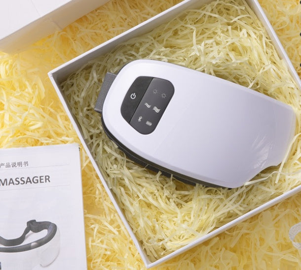 Masajeador de ojos con música Bluetooth, compresa caliente a presión de aire, ojeras, cuidado de los ojos
