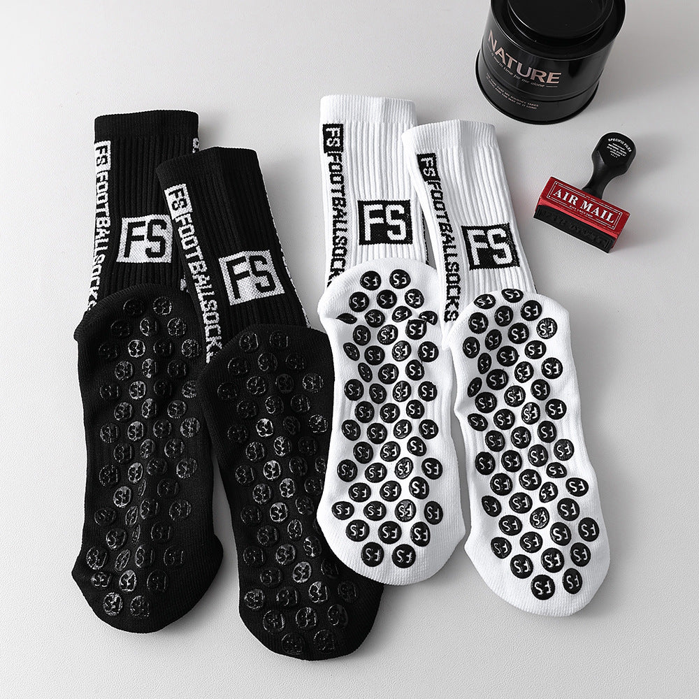 Calcetines deportivos para hombre con adhesivo de puntos de nailon para un agarre antideslizante.