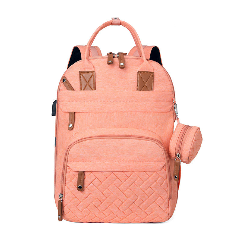 Bolsa multifuncional para cochecito con carga USB y compartimentos separados para ropa seca y húmeda.