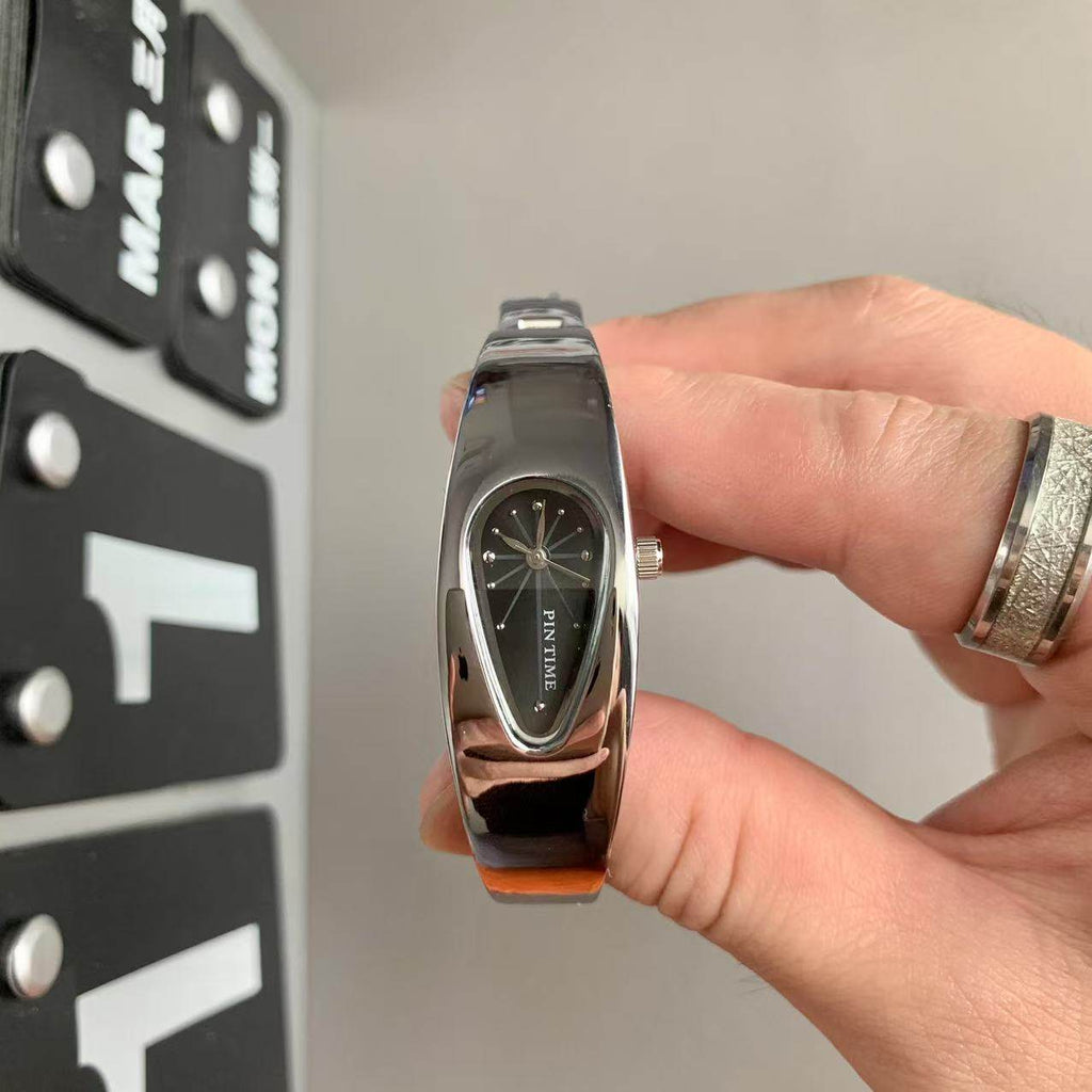 Reloj de gota de agua de moda con forma irregular y diseño retro de nicho