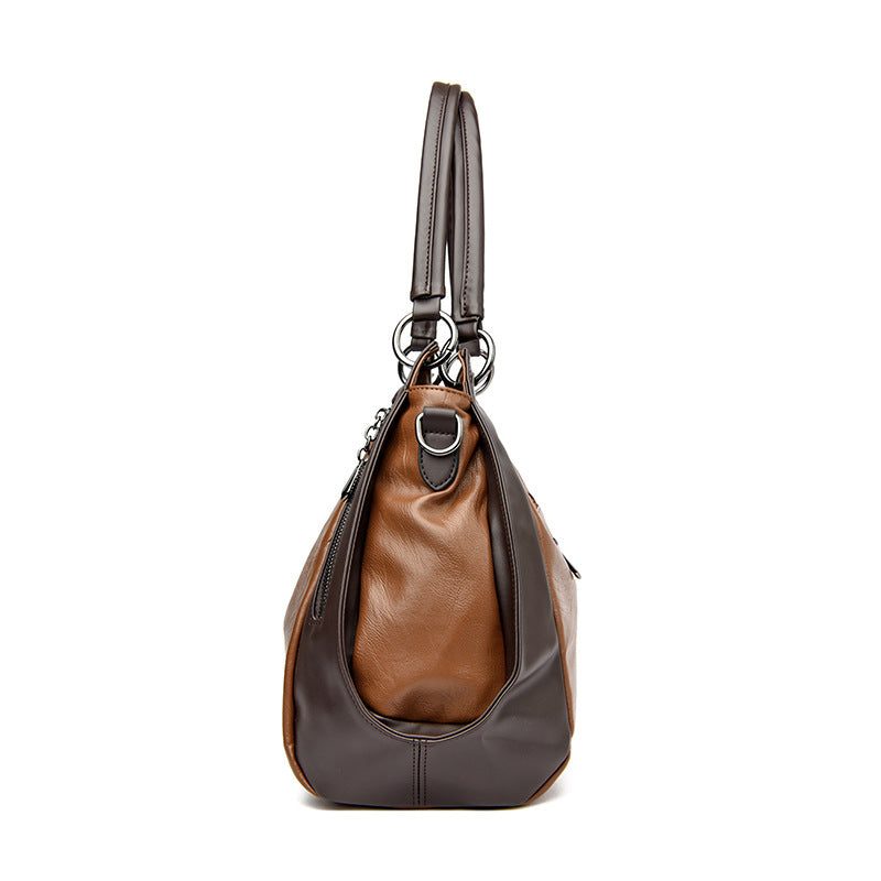 Un bolso tote de cuero suave, sencillo y versátil
