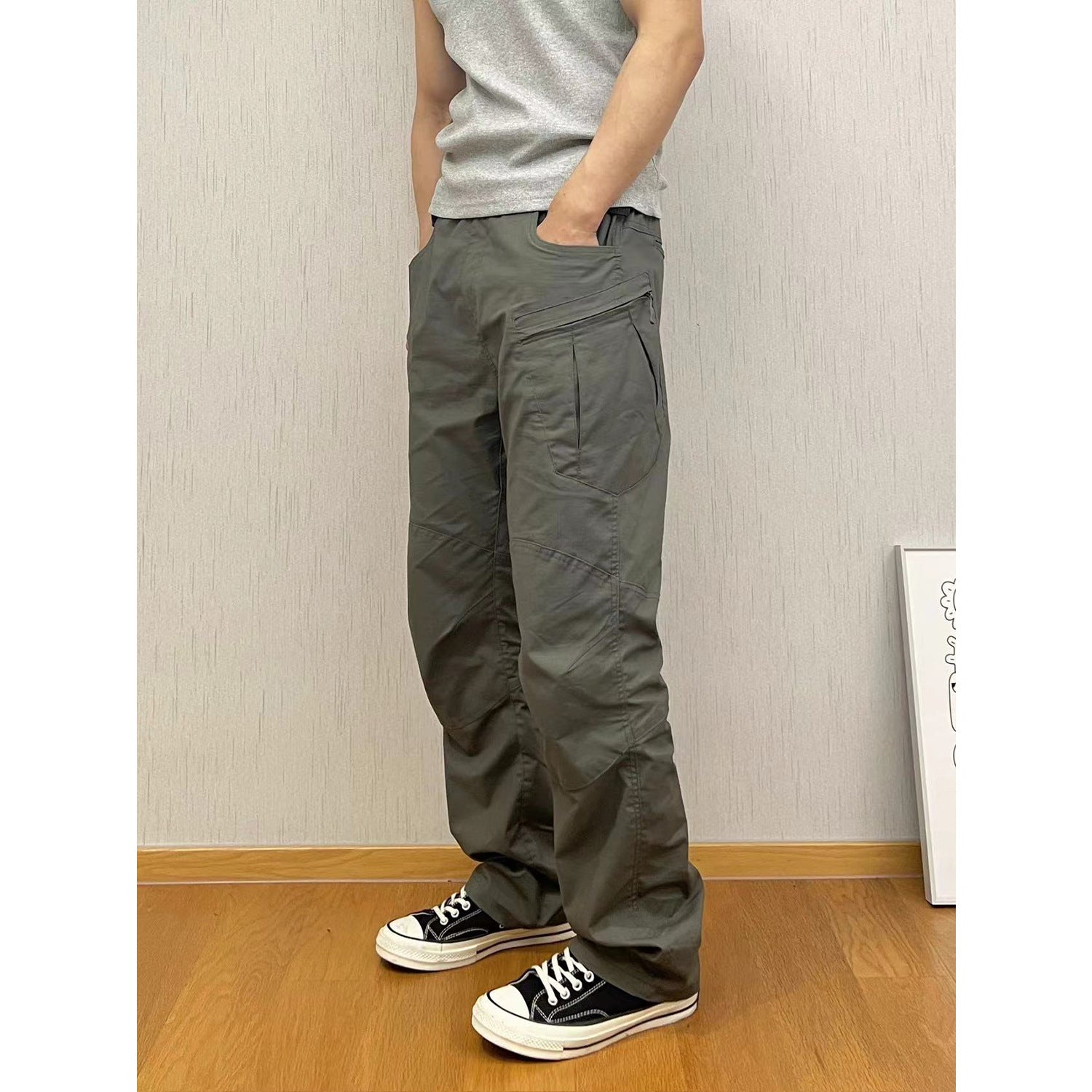 Pantalones de asalto tácticos de estilo militar con múltiples bolsillos