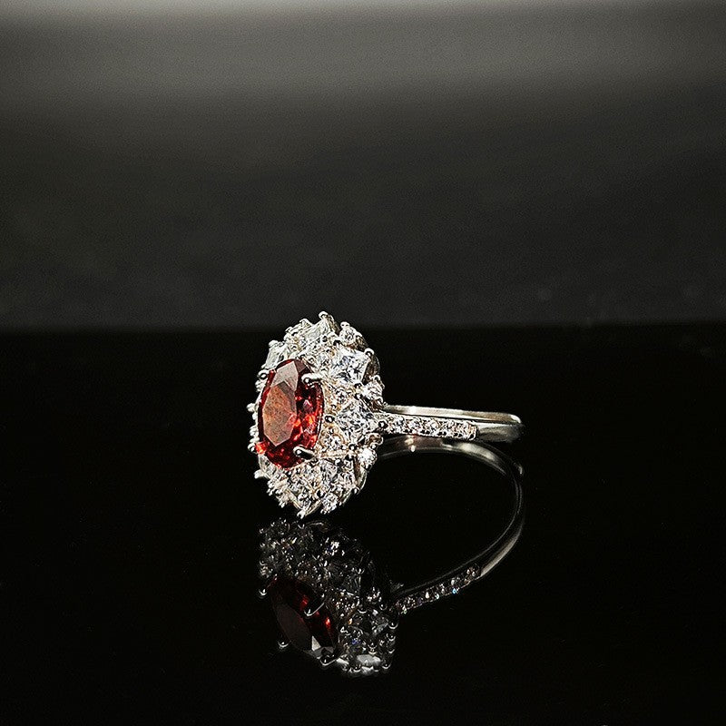 Silver Ring With An Adjustable Opening Featuring A Pigeons Blood Red High carat Zircon