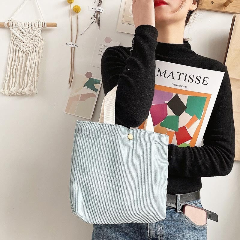 Bolso de lona minimalista de hilo grueso con estampados a doble cara. Un bolso de lona versátil y de gran capacidad para mujer.