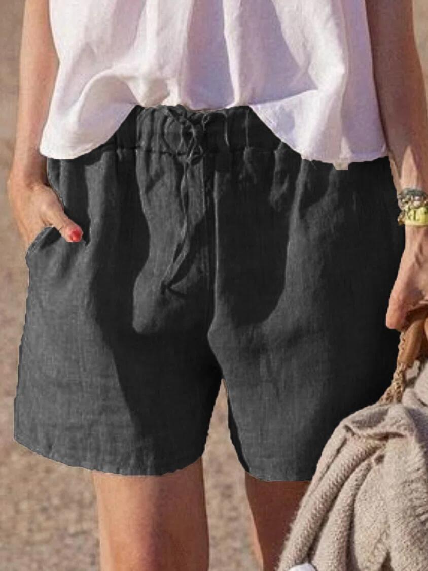Pantalones casuales holgados de algodón y lino de color liso con cintura elástica y cordón para atar.