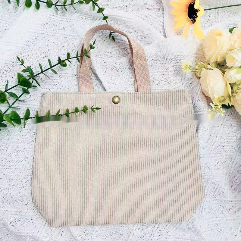 Bolso de lona minimalista de hilo grueso con estampados a doble cara. Un bolso de lona versátil y de gran capacidad para mujer.