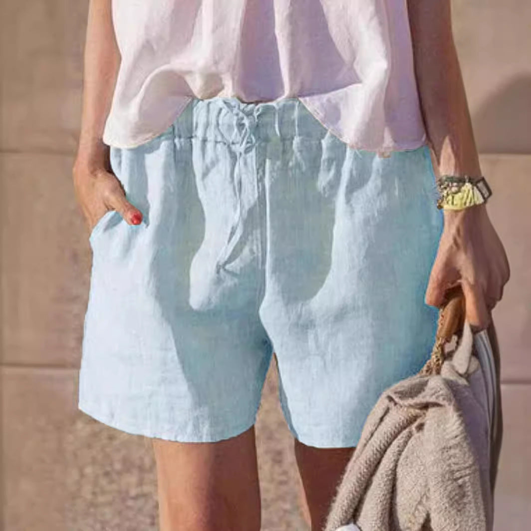 Pantalones casuales holgados de algodón y lino de color liso con cintura elástica y cordón para atar.