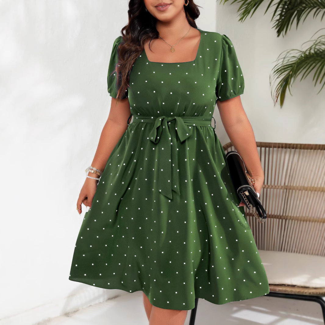 Elegante vestido retro de lunares con cintura ceñida para mujer