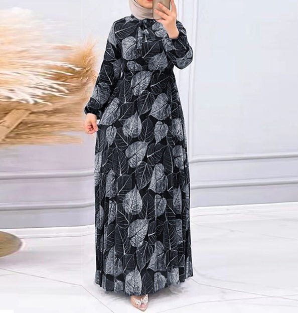 Falda plisada con estampado de hojas para mujer, vestido a la moda que adelgaza la cintura.