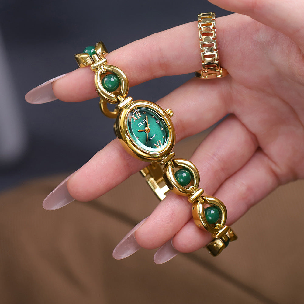 Reloj de pulsera Gedi de estilo nacional con esmeralda, atractivo, de nicho, de alta calidad, ligero, de lujo, con perlas de concha, exquisito reloj de cuarzo para mujer.