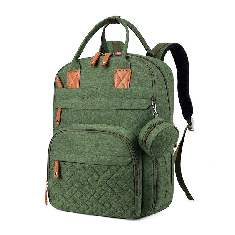 Bolsa multifuncional para cochecito con carga USB y compartimentos separados para ropa seca y húmeda.