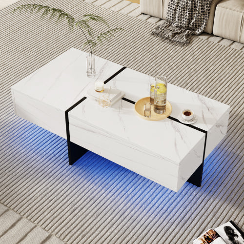 Mesa de centro de alto brillo, estructura efecto mármol blanco con elevadores negros a juego, mueble de salón con sistema de iluminación LED controlado por app.