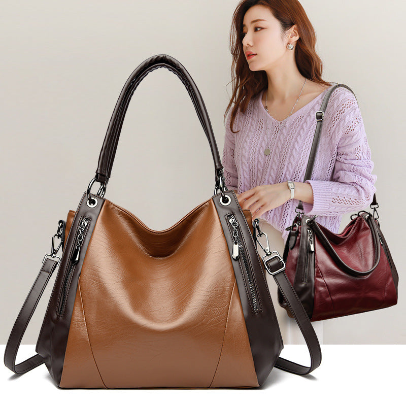 Un bolso tote de cuero suave, sencillo y versátil