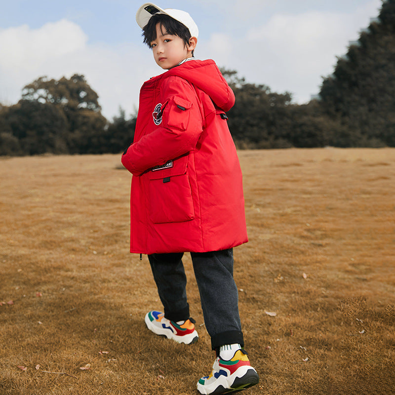 Chaqueta de plumón de longitud media para niños de color liso a la moda